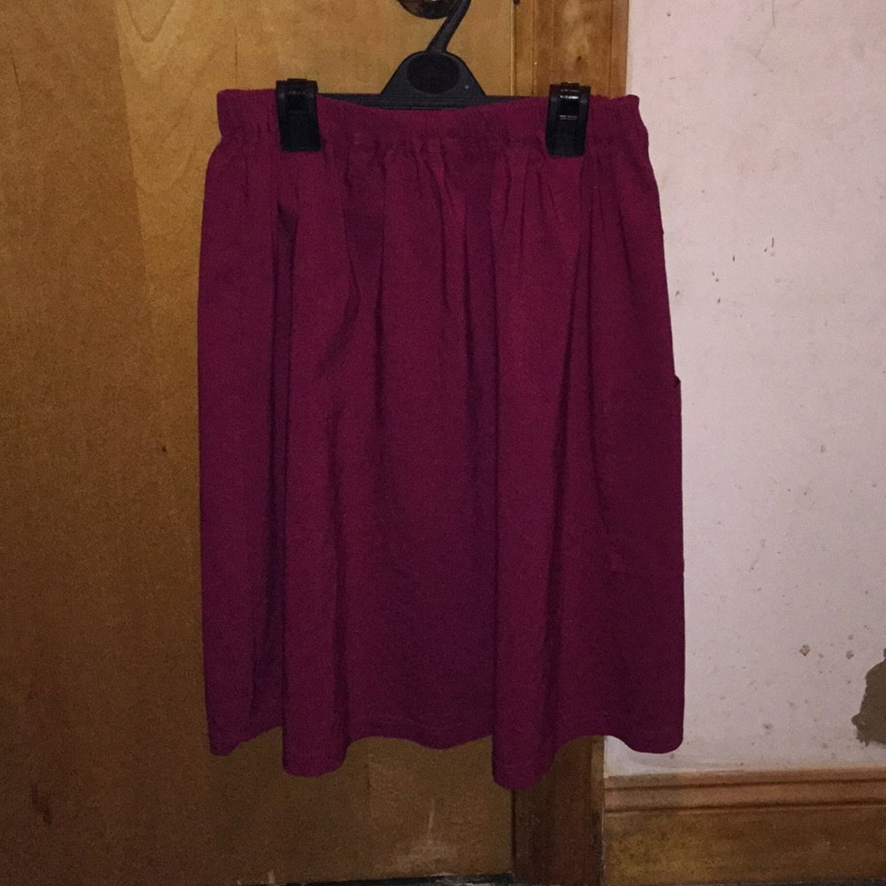 Reddish pink skirt very stretchy elastic